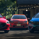 Compact cars in GT7 are parked menacingly as players await their free microtransactions.